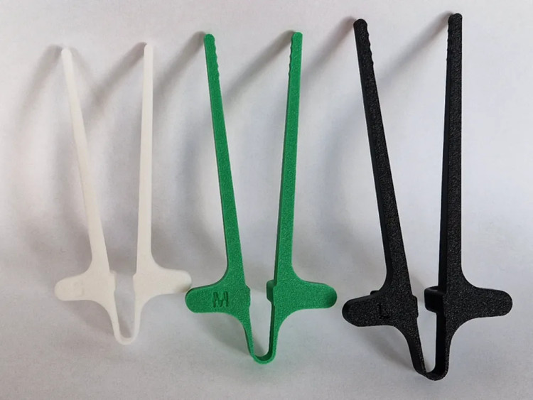 چاپستیک انگشتی گیمینگ مدل Snack Finger Clips برای خوردن چیپس و تنقلات بدون کثیف شدن دست