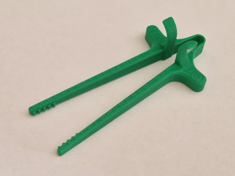 چاپستیک انگشتی گیمینگ مدل Snack Finger Clips برای خوردن چیپس و تنقلات بدون کثیف شدن دست
